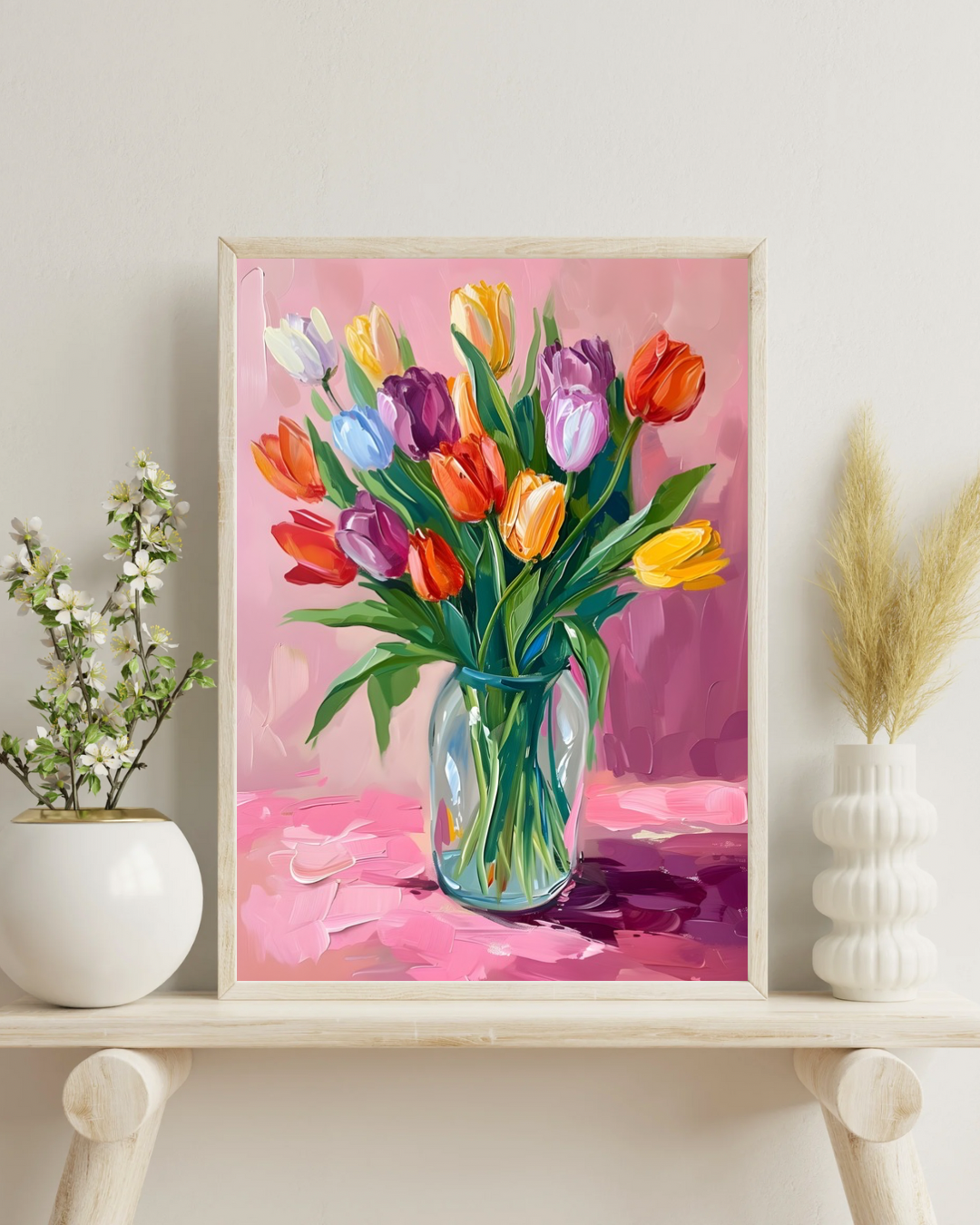 "Vibrant Tulip Bouquet

Brighten up your space with this stunning floral artwork. A colorful mix of tulips in a clear vase, set against a soft pink background, creates a warm and inviting atmosphere. Perfect for adding a p